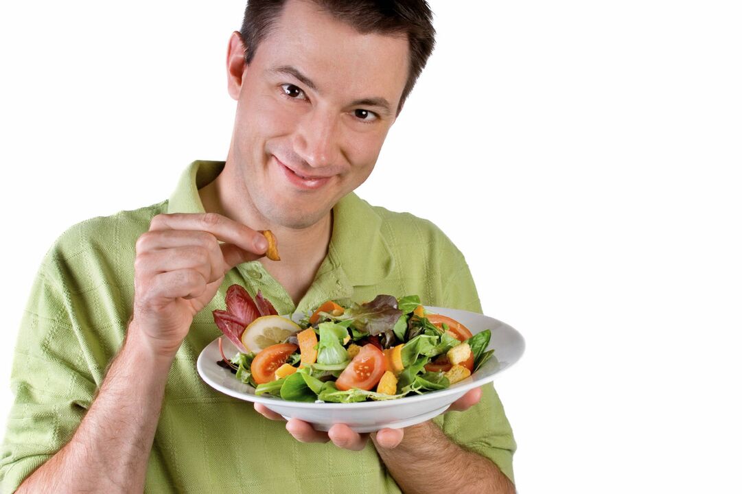 one eats vegetable salad vigorously