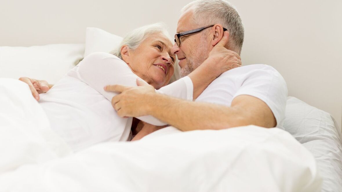 a mature couple in bed and a man with increased strength
